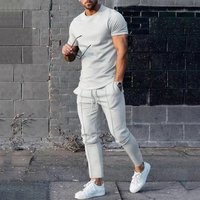 Herrer afslappet sport outfit med åndbart T-shirt og løs joggingbukser Stilla