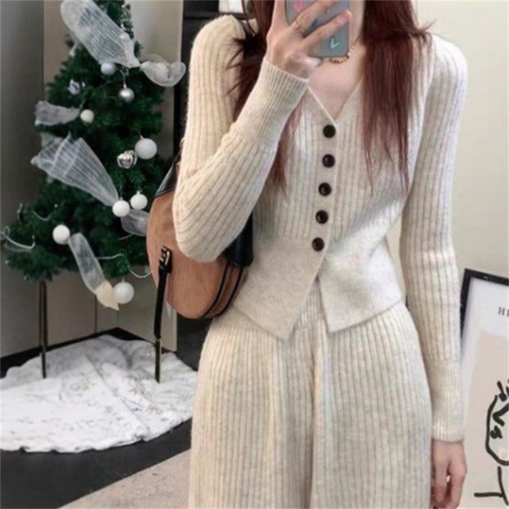 Kvinders strikket jumpsuit med knapdetaljer og afslappet pasform Stilla