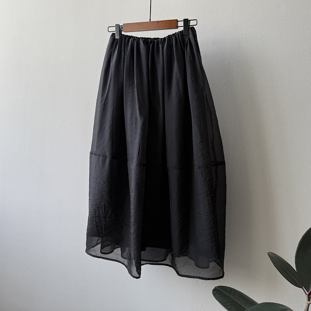 Dame Maxiskirt i let, åndbart materiale med elastisk talje og elegant snit Stilla