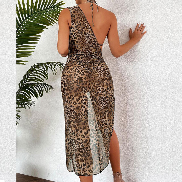 Dame triangel-bikini med moderne halterneck-top og gennemsigtig sarong drape