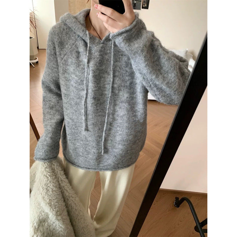 Kvinders hyggelige hætte sweatshirt lavet af blødt fleece-materiale med kengurulomme Stilla