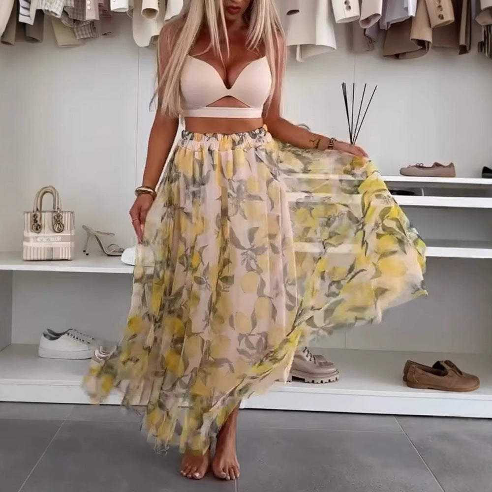 Dame med flydende Maxi-nederdel med flerlagd chiffon-overlag, elastisk talje og fint blomsterprint Skovae