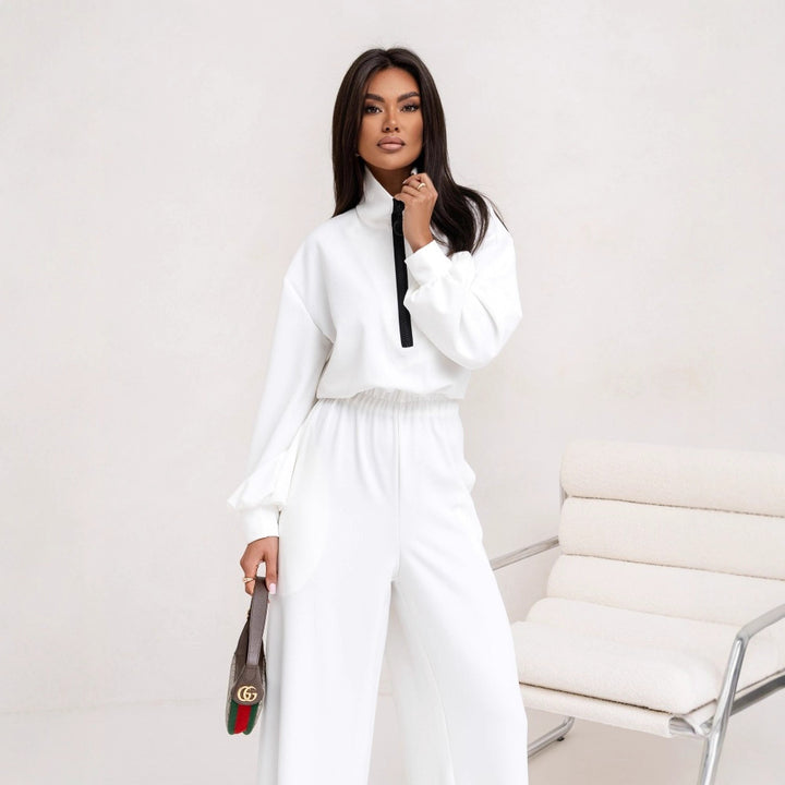 Dame sporty jumpsuit med høj krave og moderne lynlås Skovae