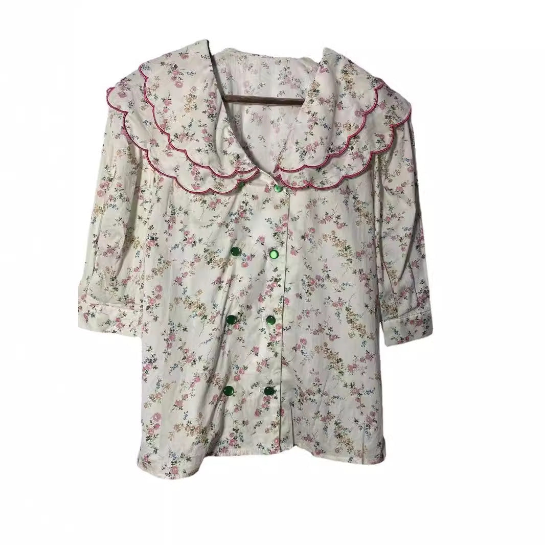 Damebluse med voluminøse puffærmer og blomsteretternet krave Stilla