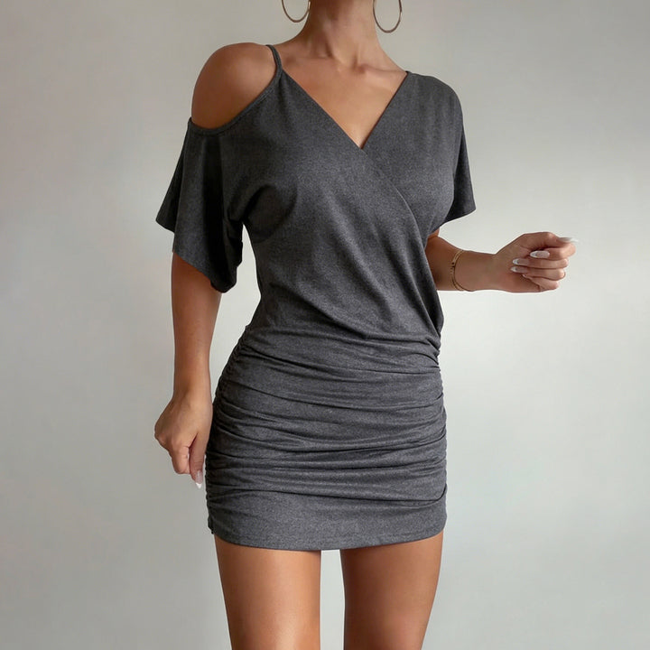 Dame wrap top med asymmetrisk skæring og afslappet design Skovae
