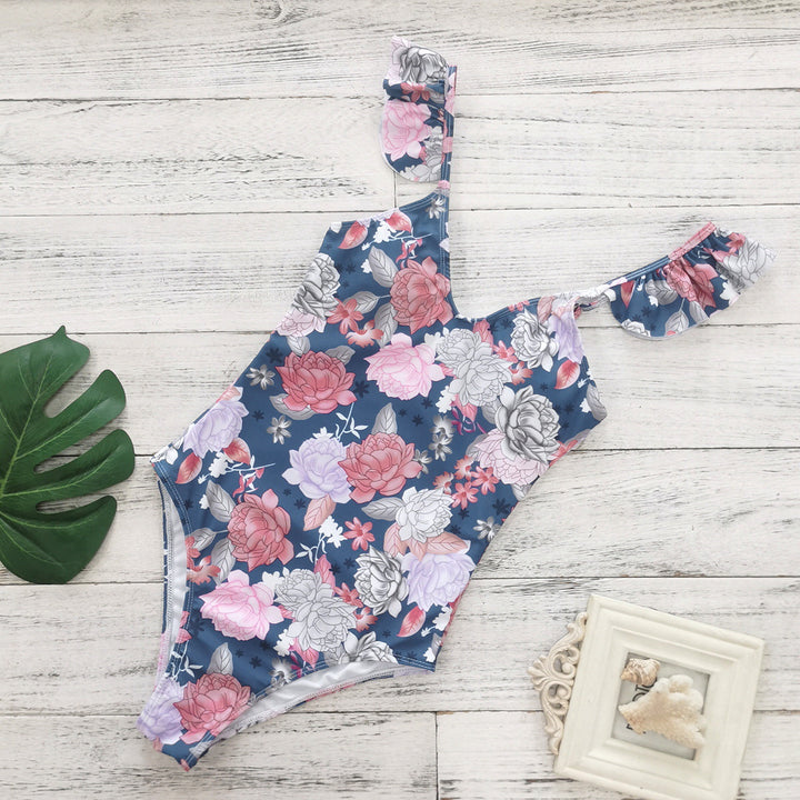 Dame Én-delt Badetøj med feminine Flædedetaljer og blomsterdesign Stilla