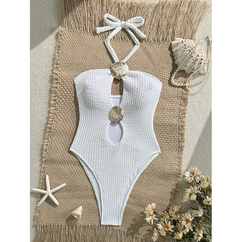 Dame badedragt med raffineret cut-out-design og gyldne accenter Skovae