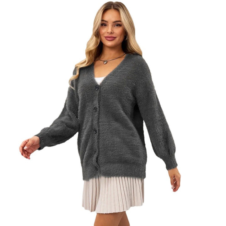Kvinders hyggelige cardigan med asymmetrisk snit og knaplukning Stilla