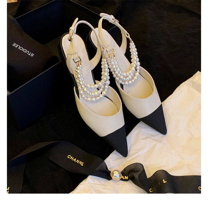 Dame sling-pumps med elegant perleapplikation og spidst formet Stilla