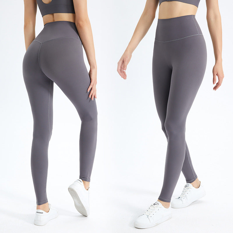 Dame højtaljede fitness leggings lavet af ultra-elastisk materiale med innovativ fugtregulering Stilla