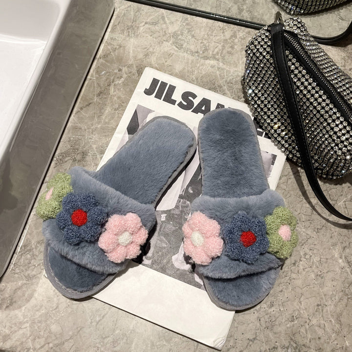 Dame hjemmesko med hyggeligt plush og legesyg blomster-applikation Stilla
