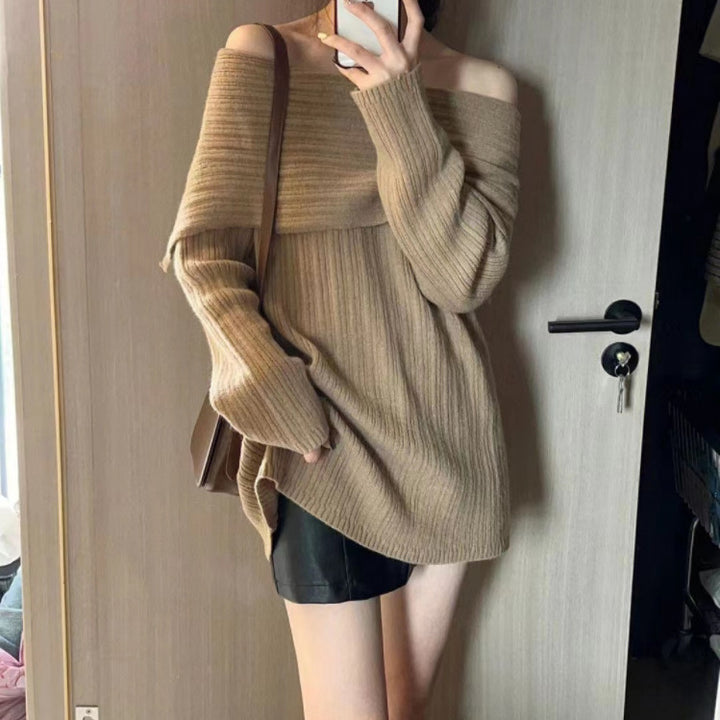 Kvinders off-shoulder sweater lavet af struktureret strikmateriale Stilla