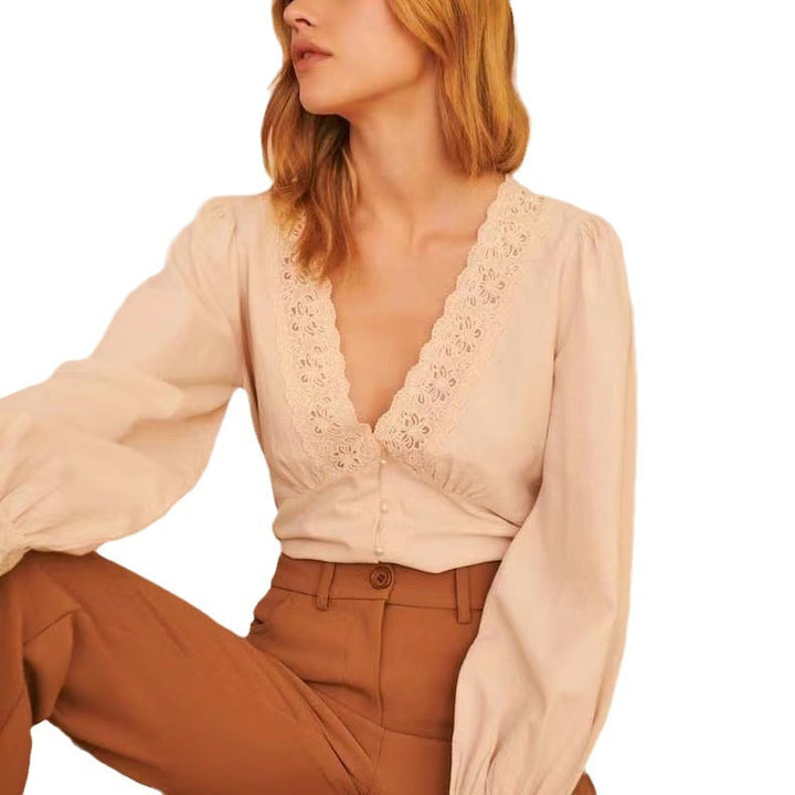Damebluse med luksuriøse spidsedesign og voluminøse ærmer Stilla
