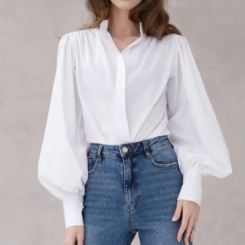Damebluse med voluminøse ærmer og klassisk ståkrave Stilla