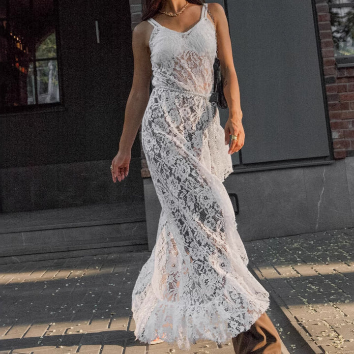 Dame spidsmaxikjole med elegante asymmetrisk flæser Stilla