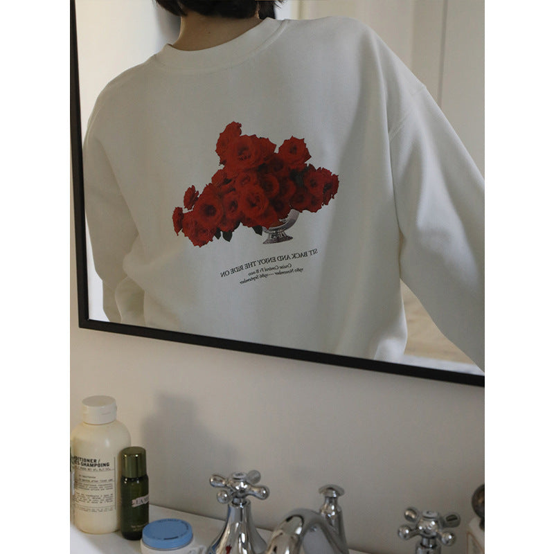 Dame hyggelig sweatshirt med blomstret print og afslappet snit Stilla