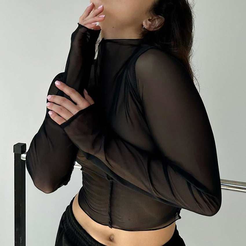 Dame Gennemsigtig Bluse med voluminøse ærmer og elegante knapdetaljer Stilla