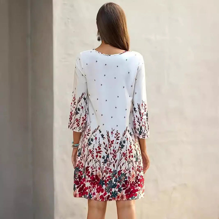 Dame sommerkjole med floralt design og V-udskæring Stilla
