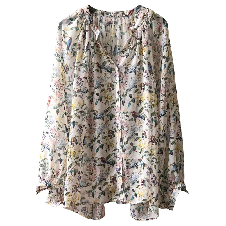Dame luftig bluse med blomstret design og raffineret knaplukning Stilla