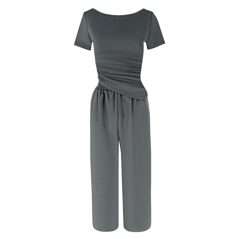 Dame jumpsuit med asymmetrisk snit og bredt skåret ben Skovae