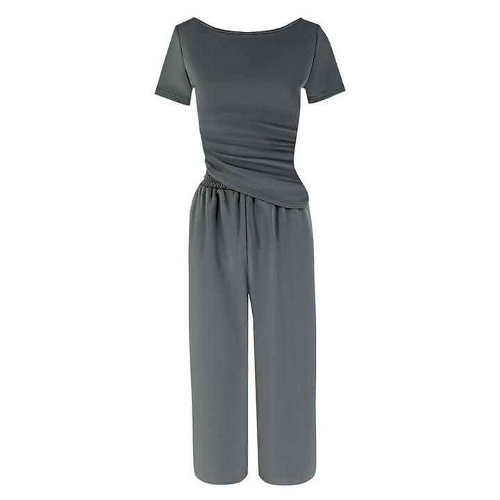 Dame jumpsuit med asymmetrisk snit og bredt skåret ben Skovae