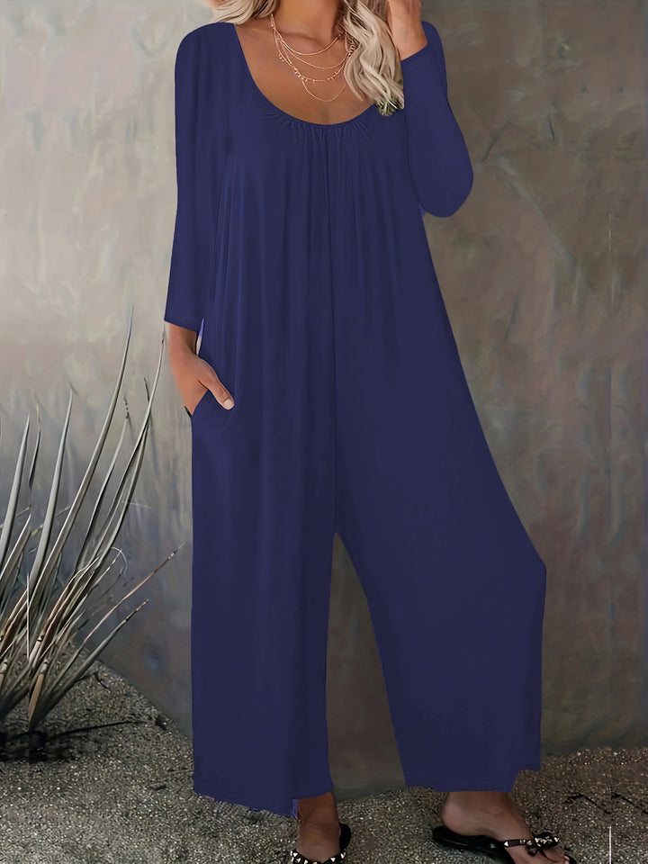Kvinders bredskårede jumpsuit med praktiske lommer og moderne snit Stilla