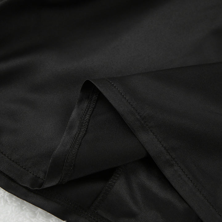 Dame kortærmet pyjamas-sæt med knapdetaljer og elastisk talje Stilla
