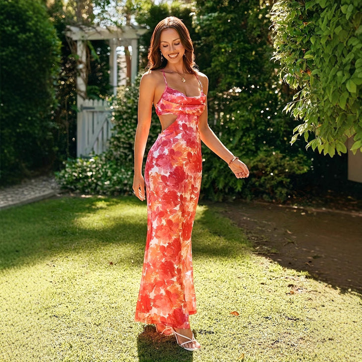 Dame Elegant sommerkjole med cut-out-detaljer og blomsterdesign Stilla