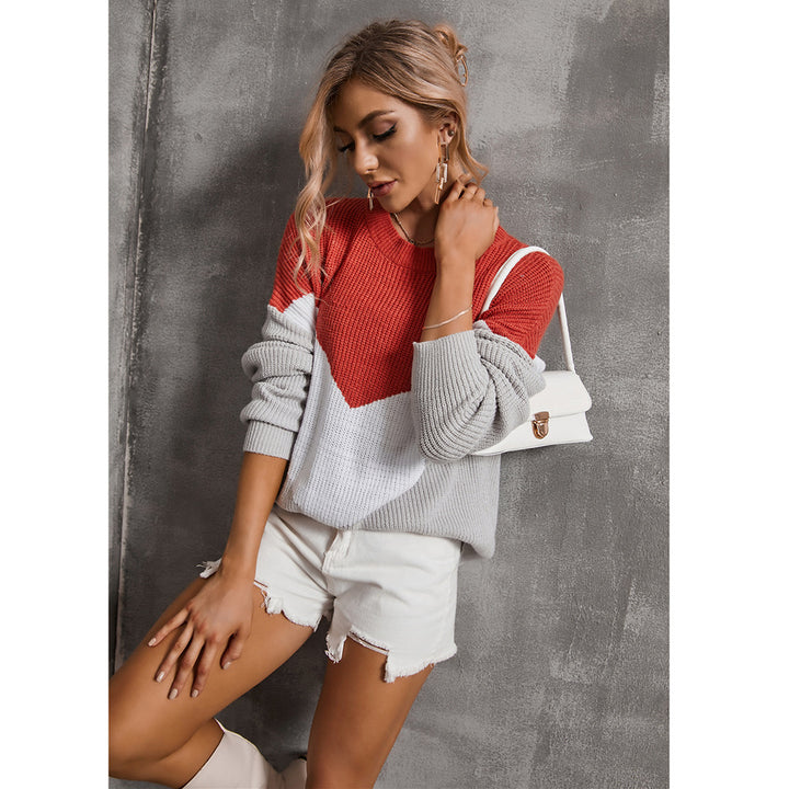 Dame mode strikket sweater med iøjnefaldende V-hals og grafisk design Stilla
