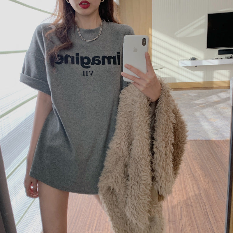Kvinders komfortable oversized T-shirt med kreativt print og afslappet snit