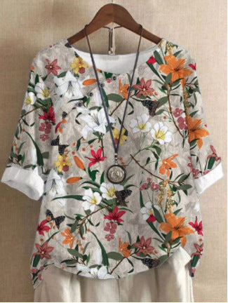 Damer bomuldsbluse med blomstertryk og elegant knaplukning Stilla