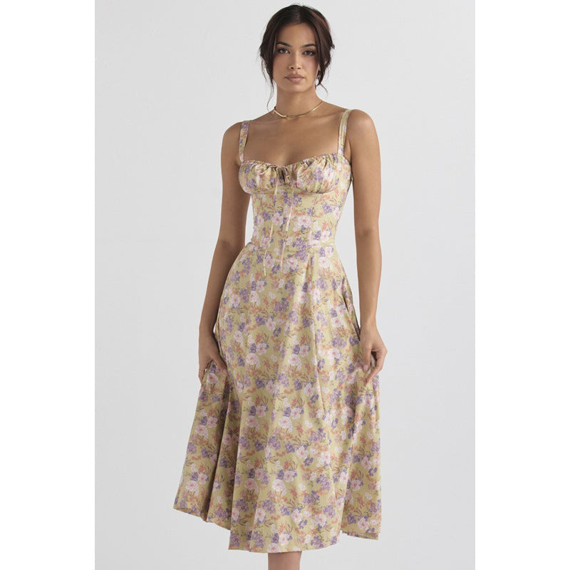 Dame maxikjole med floral design og elegant slids Skovae