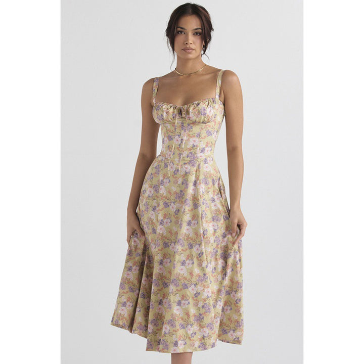 Dame maxikjole med floral design og elegant slids Skovae
