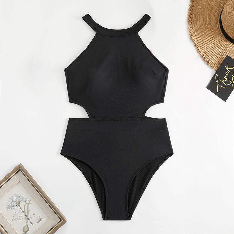 Dame én-dels badedragt med moderne cut-out-design og sporty stropper Stilla