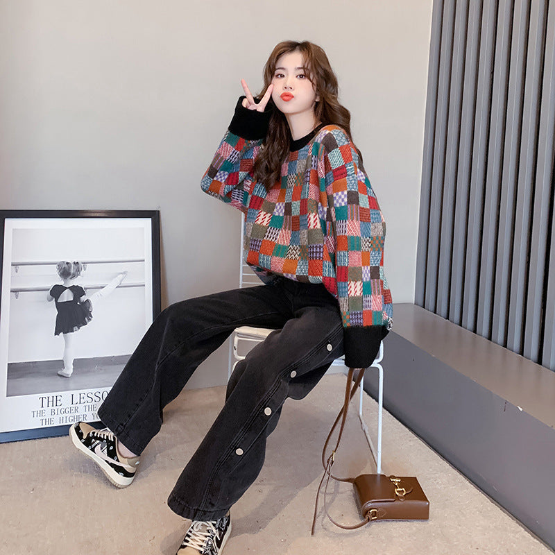 Dame stilfuld sweater med ternet mønster og casual snit Stilla