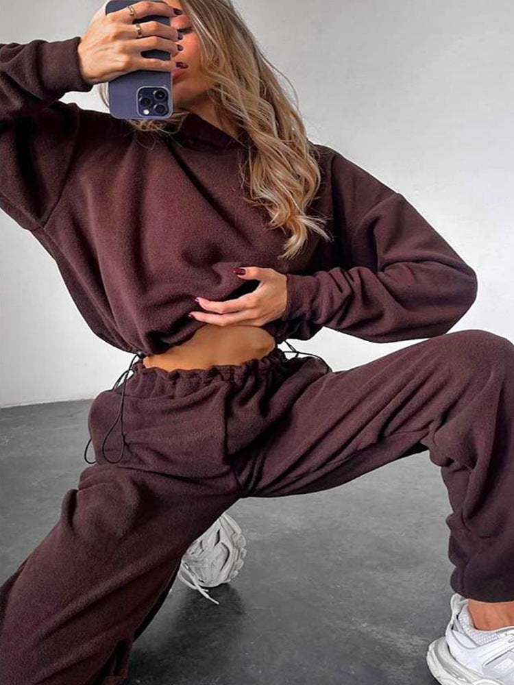 Kvindernes komfortable fleece jumpsuit med hætte og elastisk talje