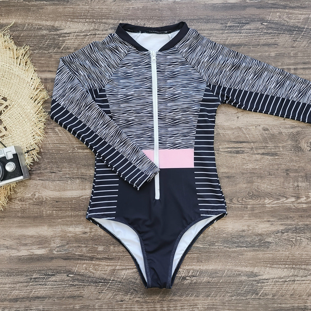 Dame Sporty Énstykket Badedragt med moderne lynlås og elegant mønstring Stilla
