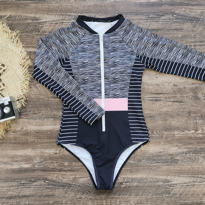 Dame Sporty Énstykket Badedragt med moderne lynlås og elegant mønstring Stilla
