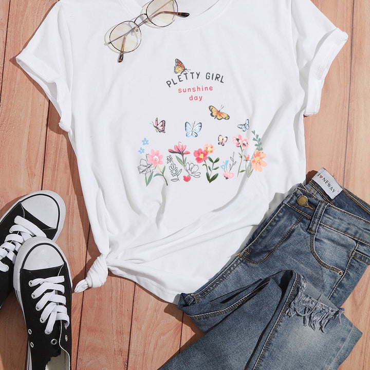 Kvinders t-shirt med legende blomsterprint og elegant print Stilla
