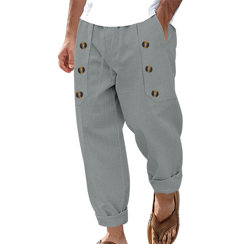 Herren nan loose linen pants with decorative button stripes, rolled ankle hem and side pockets Skovae