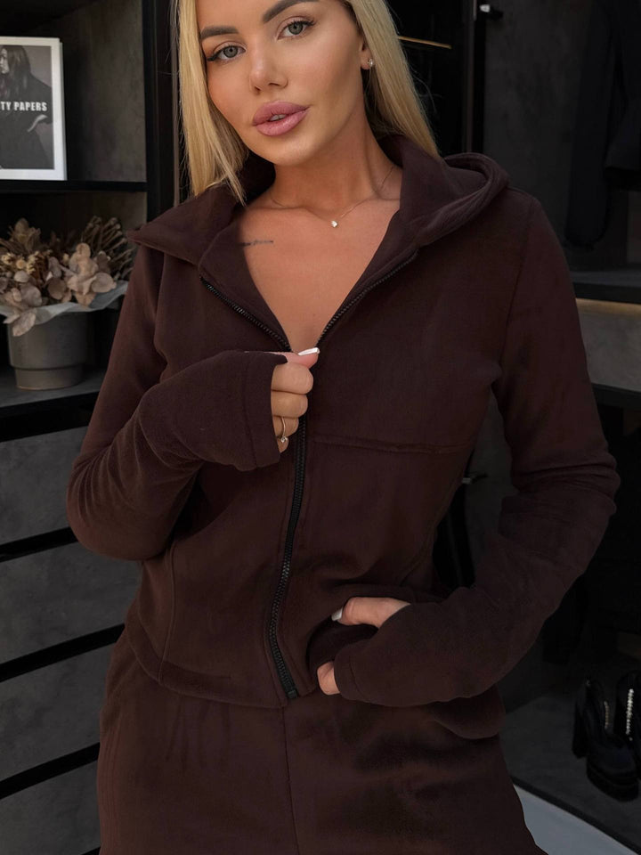 Kvinders fleece jumpsuit med høj krave og praktiske lommer