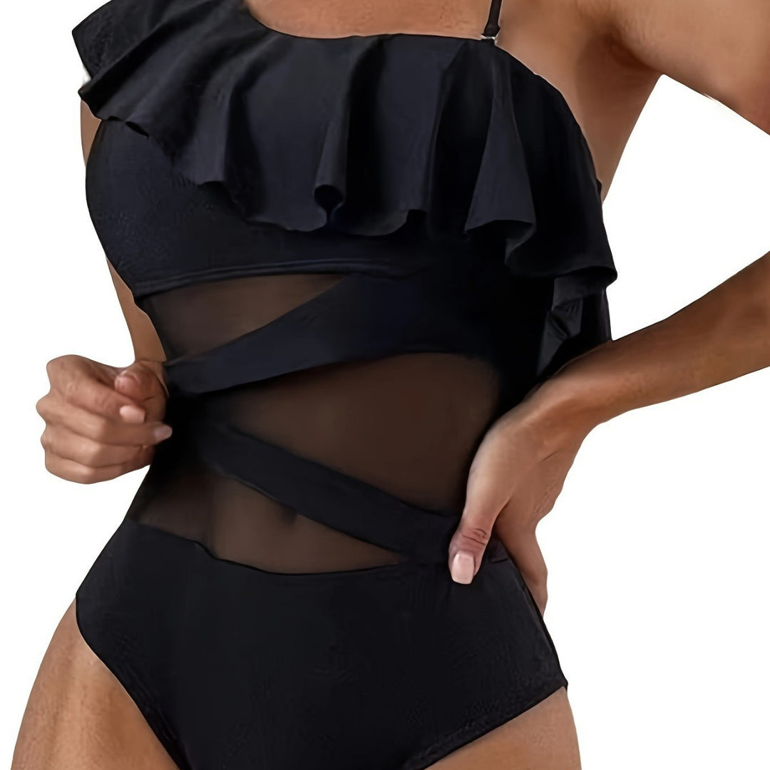 Dame one-piece badesuit med asymmetrisk ruffles design og elegante cut-out detaljer Skovae
