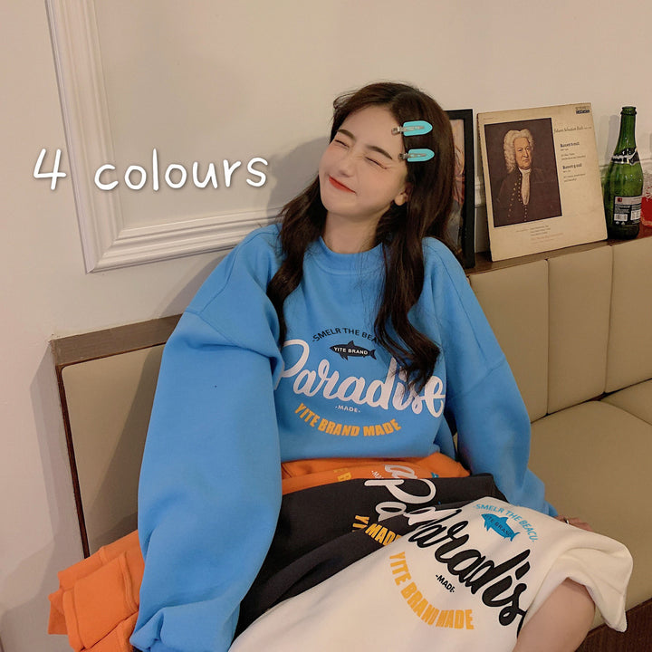 Kvinders afslappede oversized sweater med kreativt grafisk design og materialer af høj kvalitet