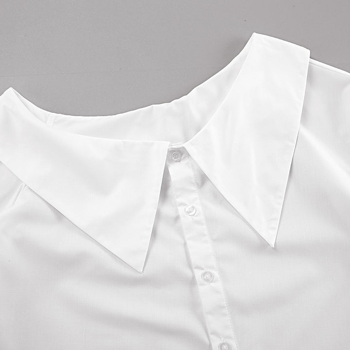 Dame Oversized Skjorte med asymmetrisk Udsnit og voluminøse Ærmer Stilla