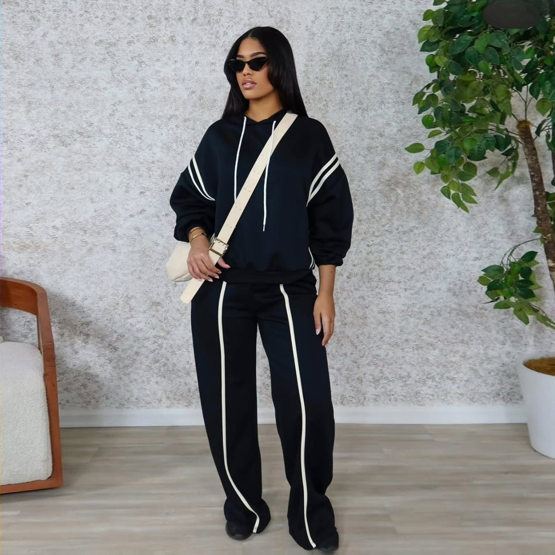 Kvinders sporty hoodie og bukser med brede ben med elegante striber