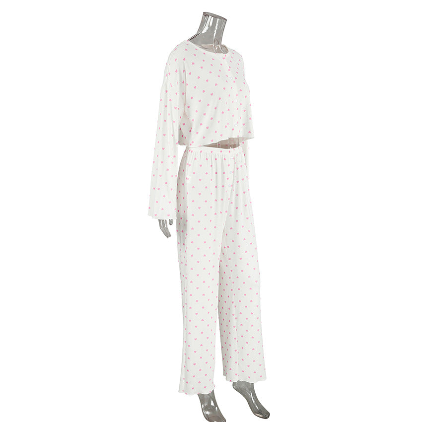 Dame luksuriøst pyjamas-sæt med stribet top og behagelige loose-fit bukser Stilla