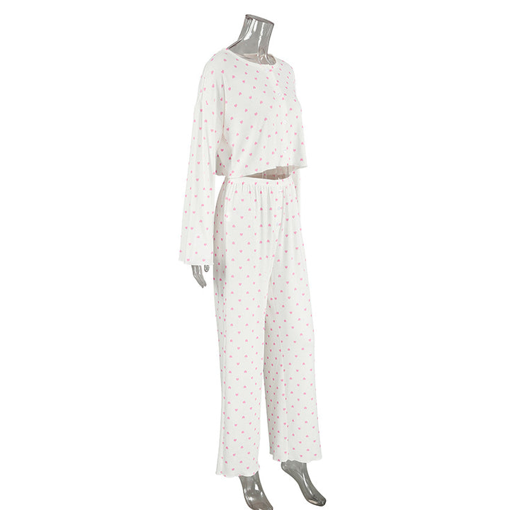 Dame luksuriøst pyjamas-sæt med stribet top og behagelige loose-fit bukser Stilla