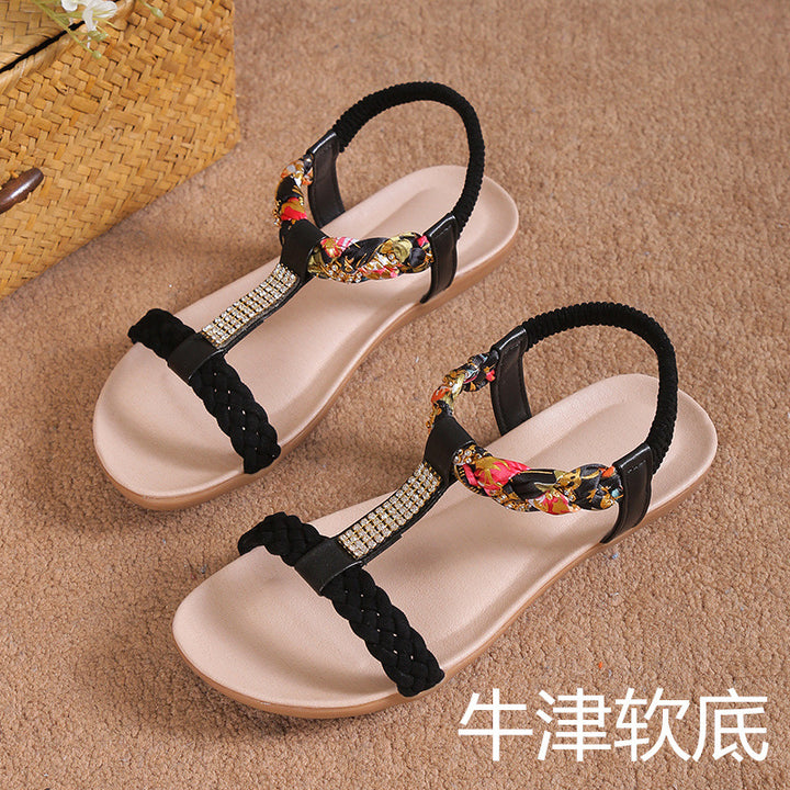 Dame sandaler i fashionable flet-design med elegante smykkedetaljer Stilla