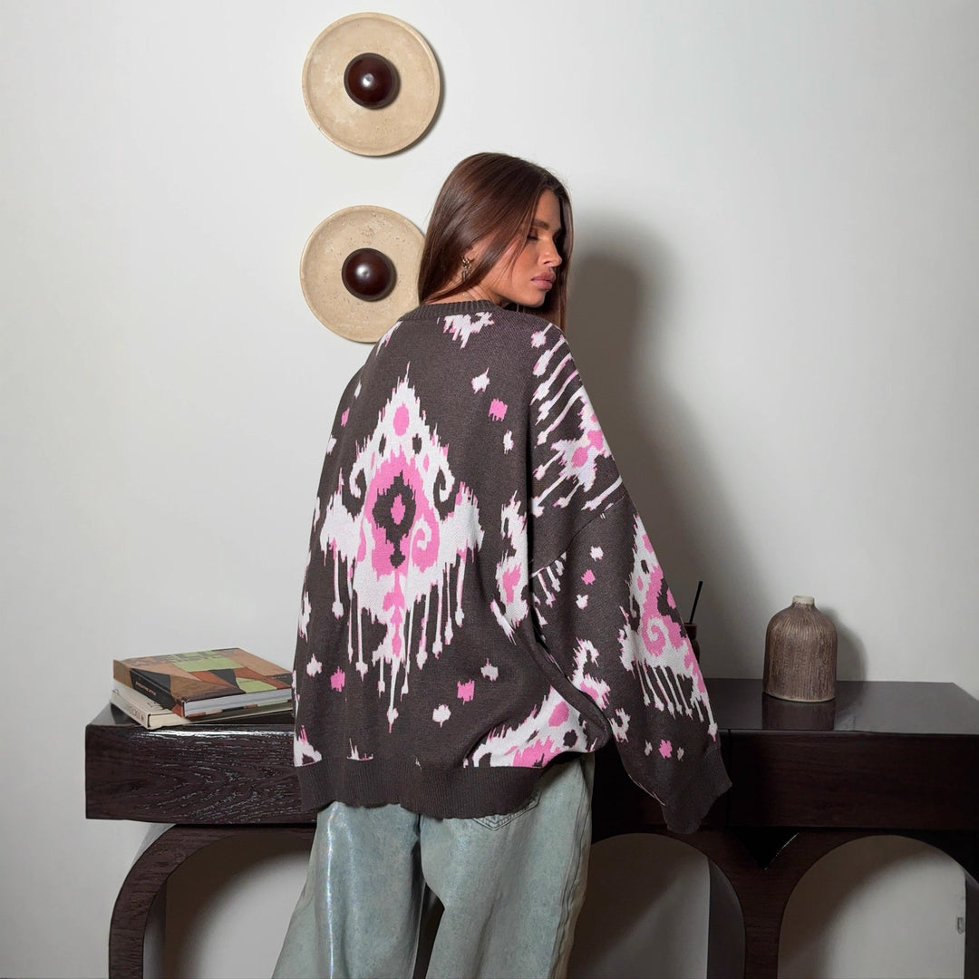 Kvinders oversized sweater med unikt mønster og knaplukning Stilla