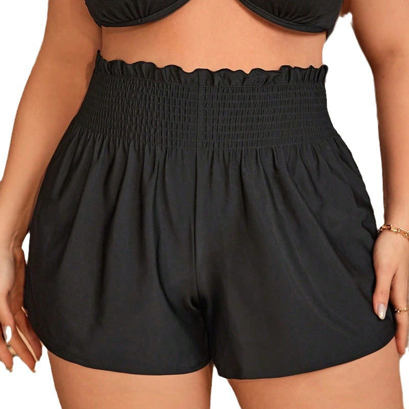 Dame badeshorts med elastisk linning og moderne flæser